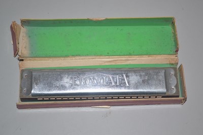 Lot 120 - A Traviata mouth organ in box