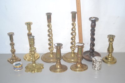 Lot 209 - Quantity of pairs of brass candlesticks...