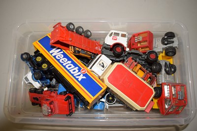 Lot 523 - Small plastic box containing a quantity of toy...