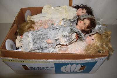 Lot 539 - Box containing a quantity of modern dolls on...