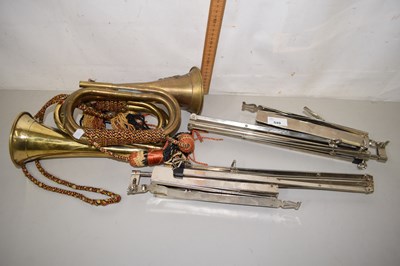 Lot 549 - Brass trumpet and music stands