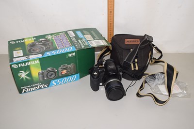Lot 557 - A digital camera S5000 in original box