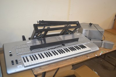Lot 706 - A Yamaha Tyros 3 keyboard with speakers