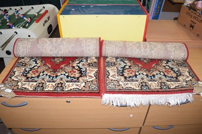 Lot 737 - A pair of modern woollen floor rugs with tassles