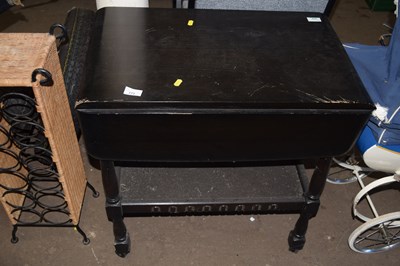 Lot 773 - A black painted folding table