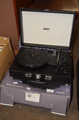 Lot 790 - A boxed Akai retro portable rechargeable...
