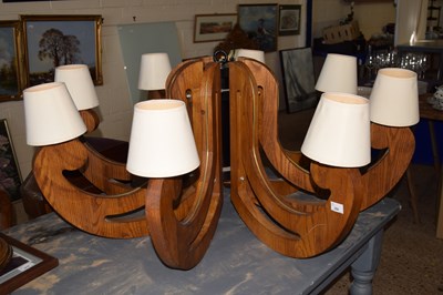 Lot 280 - An eight branch mid 20th Century wooden...