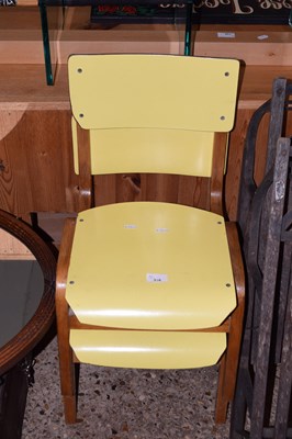 Lot 316 - Two yellow child's stacking chairs