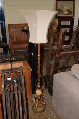 Lot 318 - A standard lamp with gilt cherubs to base