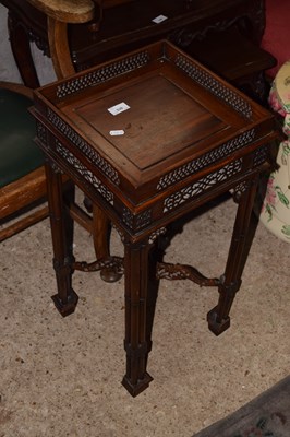 Lot 326 - A mahogany square fret carved side table