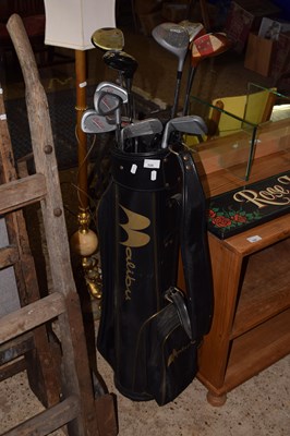 Lot 335 - Golf caddy and clubs