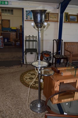 Lot 313 - A metal uplighter with two mirrored shelves