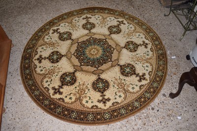 Lot 340 - A round wool rug
