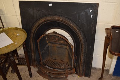 Lot 351 - A cast iron fire grate and surround