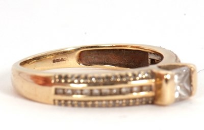 Lot 67 - A 9ct diamond ring, set with a central...