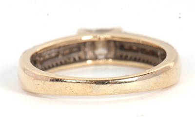 Lot 67 - A 9ct diamond ring, set with a central...
