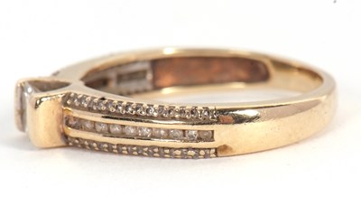 Lot 67 - A 9ct diamond ring, set with a central...
