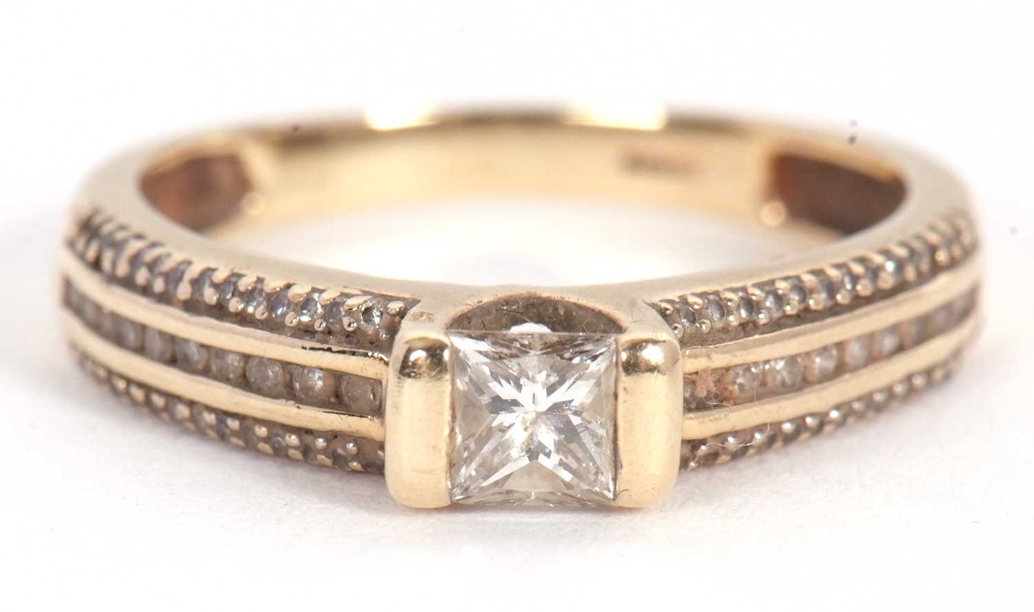 Lot 67 - A 9ct diamond ring, set with a central...