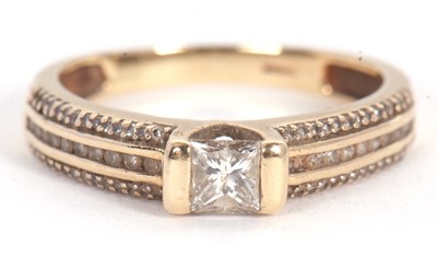 Lot 67 - A 9ct diamond ring, set with a central...