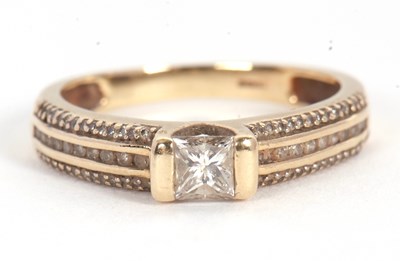 Lot 67 - A 9ct diamond ring, set with a central...