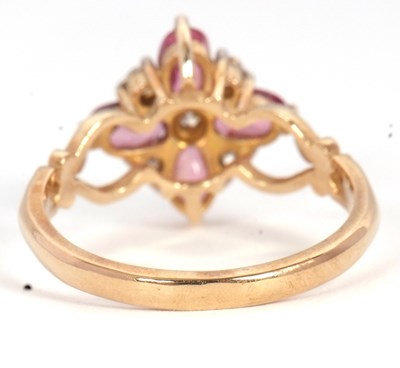 Lot 68 - A 9ct diamond and pink stone ring, with a...