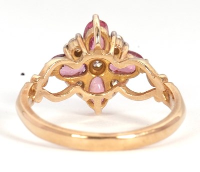 Lot 68 - A 9ct diamond and pink stone ring, with a...