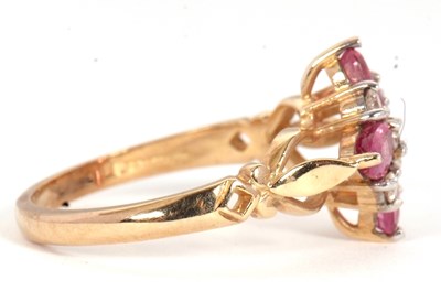 Lot 68 - A 9ct diamond and pink stone ring, with a...