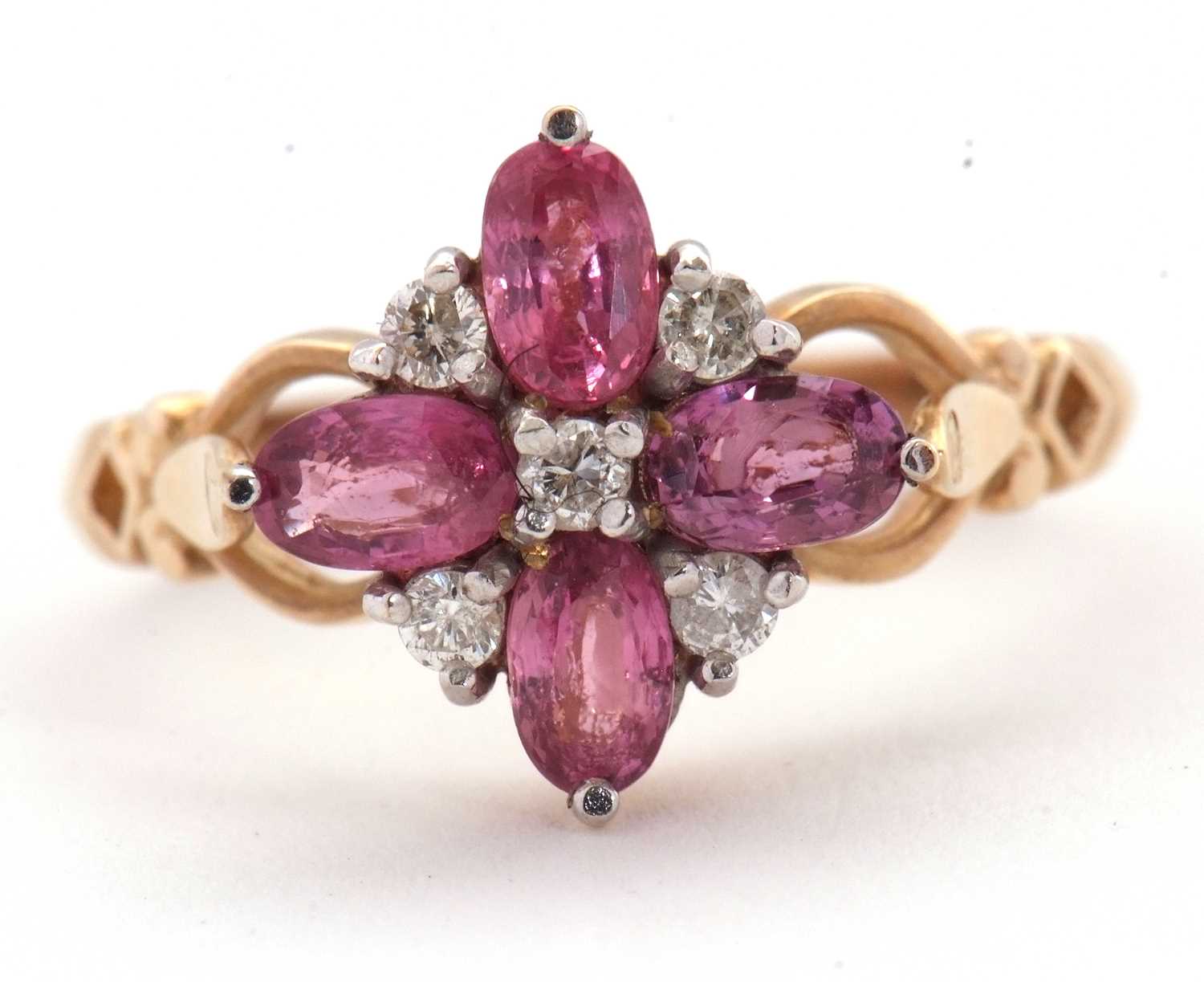 Lot 68 - A 9ct diamond and pink stone ring, with a...
