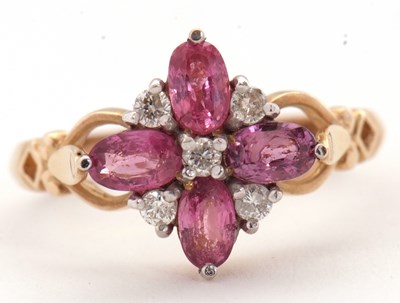 Lot 68 - A 9ct diamond and pink stone ring, with a...