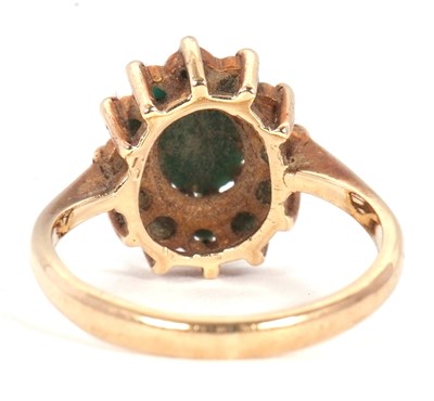 Lot 69 - A 9ct turquoise cluster ring, with a central...