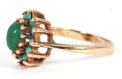 Lot 69 - A 9ct turquoise cluster ring, with a central...
