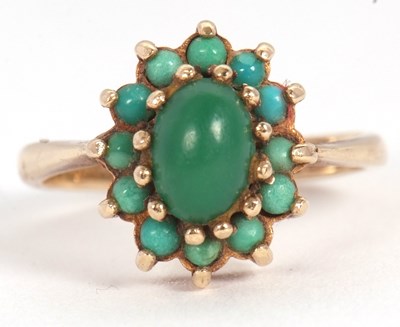 Lot 69 - A 9ct turquoise cluster ring, with a central...