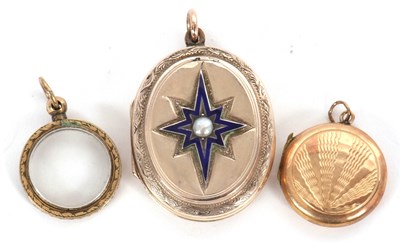 Lot 152 - Three pendants: to include an oval locket with...