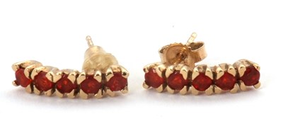 Lot 125 - A pair of 9ct gemset earrings, each set with...