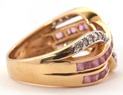 Lot 38 - An 18ct diamond and pink stone ring, set with...