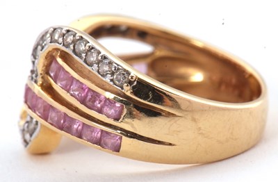 Lot 38 - An 18ct diamond and pink stone ring, set with...