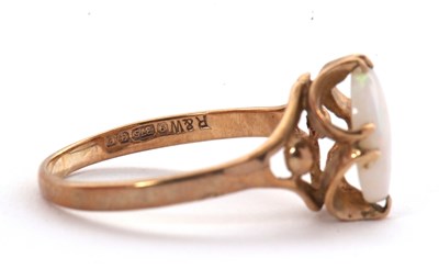 Lot 39 - A 9ct opal ring, the oval opal cabochon, claw...