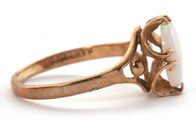 Lot 39 - A 9ct opal ring, the oval opal cabochon, claw...