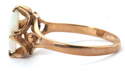 Lot 39 - A 9ct opal ring, the oval opal cabochon, claw...