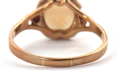 Lot 39 - A 9ct opal ring, the oval opal cabochon, claw...