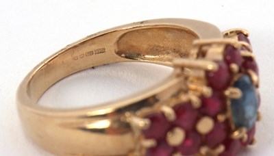 Lot 40 - A 9ct ruby and sapphire ring, set with an oval...