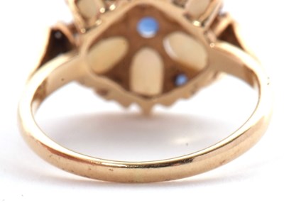 Lot 41 - A 14ct opal and sapphire ring, set with a...
