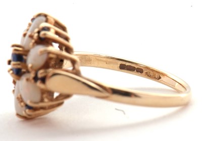 Lot 41 - A 14ct opal and sapphire ring, set with a...