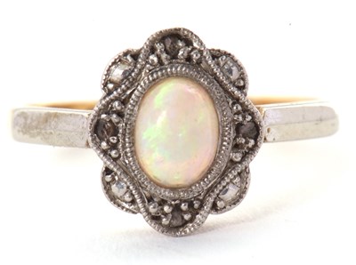 Lot 43 - An early 20th century opal ring, set with an...