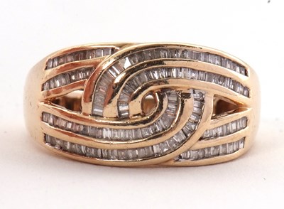 Lot 49 - A 9ct diamond crossover ring, the knot style...