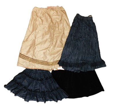 Lot 11 - Four skirts: to include a Victorian brown...