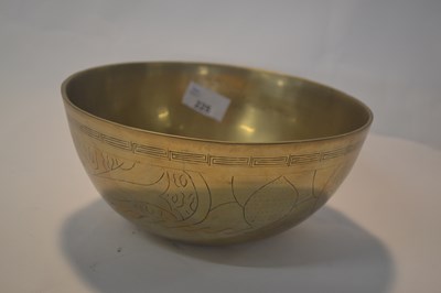 Lot 225 - A Tibetan singing bowl with four character...