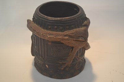 Lot 228 - A Chinese pottery brush pot with designs of...
