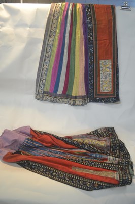 Lot 235 - Two Chinese textile skirts with embroidered...