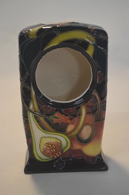 Lot 259 - A Moorcroft clock case in the Queens Choice...